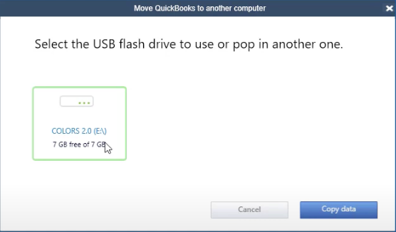 Screenshot showing the USB drive selection screen in the QuickBooks Migrator Tool.